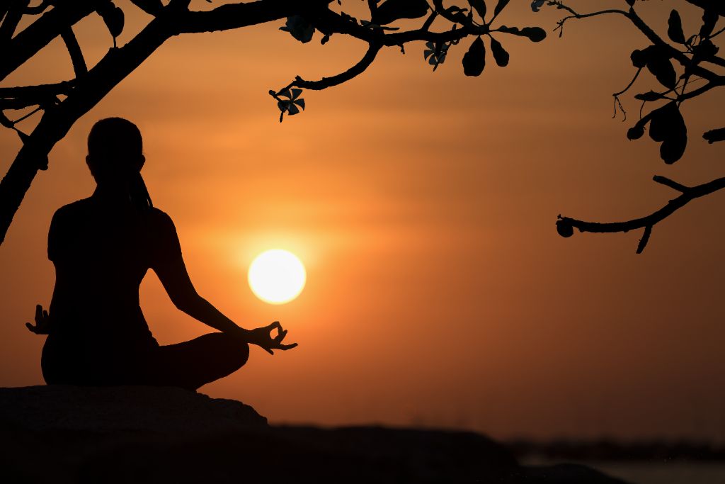 Meditation and mindfulness at sunset